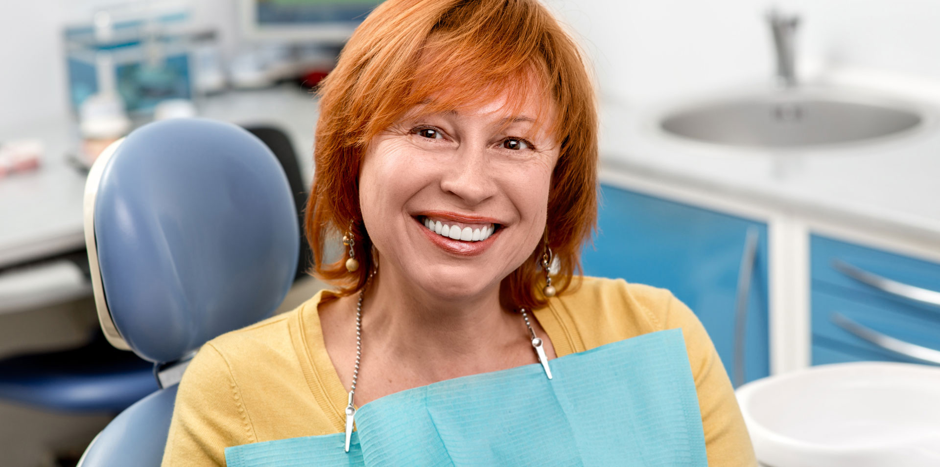Senior woman at dental clinic