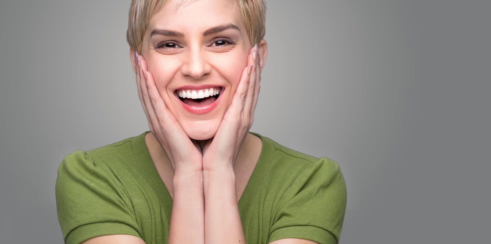 Happy woman after having dental fillings